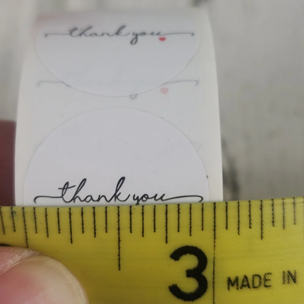 1 roll of 500 white Thank You stickers black cursive red heart